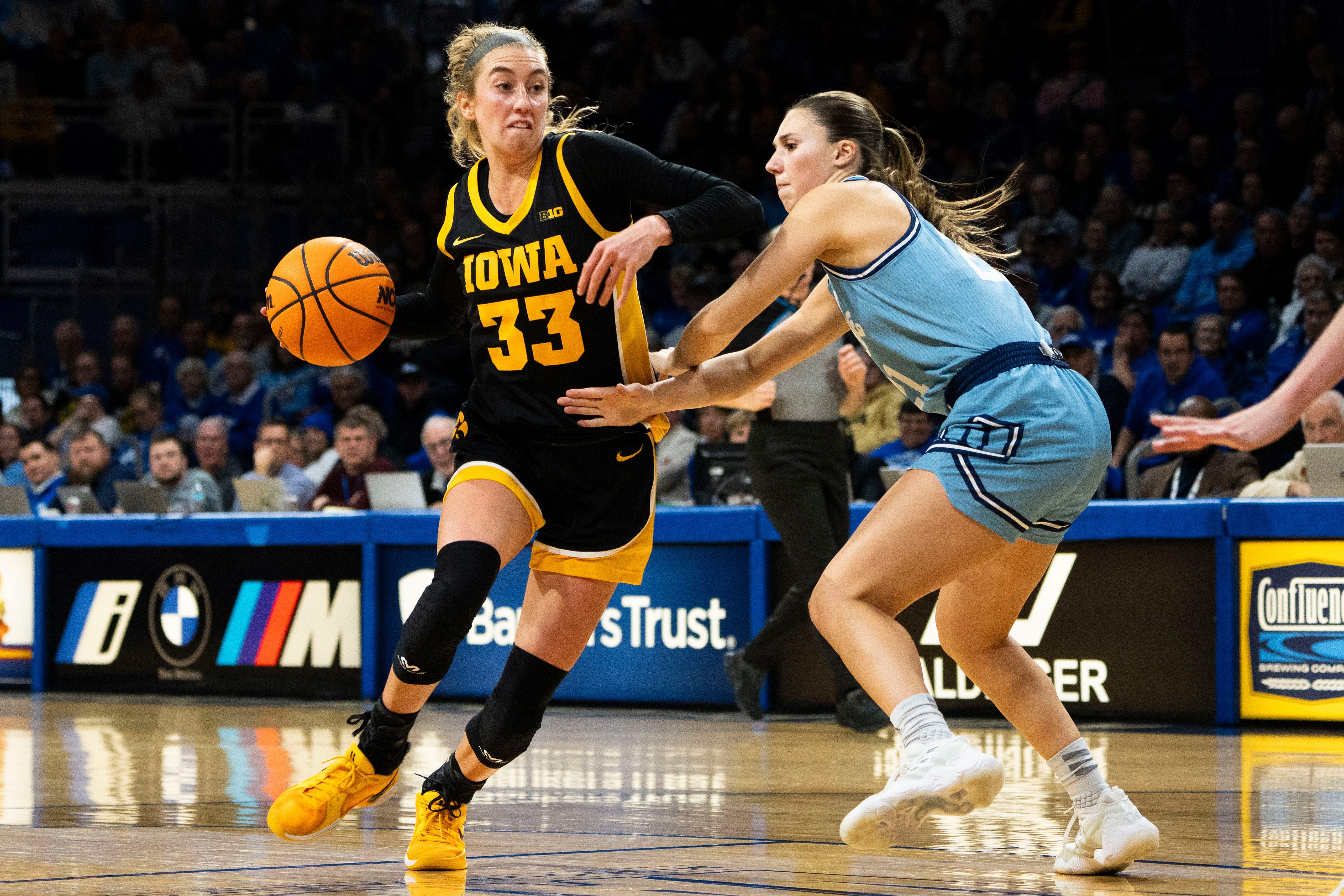 Lucy Olsen (33) in action for Iowa during a women's basketball game (Credits: IMAGN)